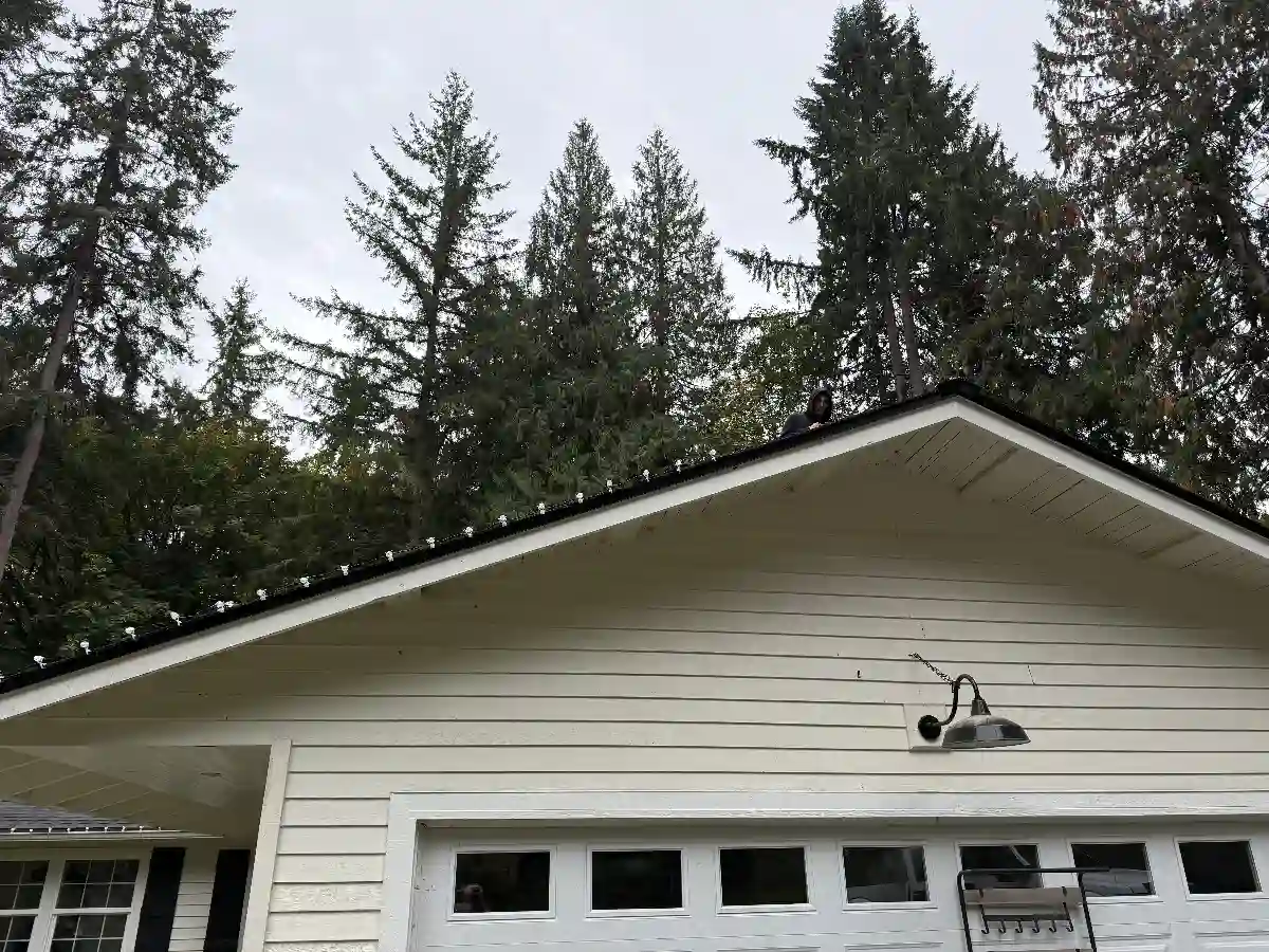 Holiday light installation on garage gable in Bellevue