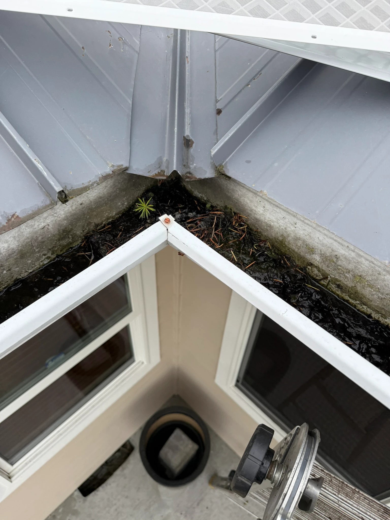 Inside gutter corner before replacement