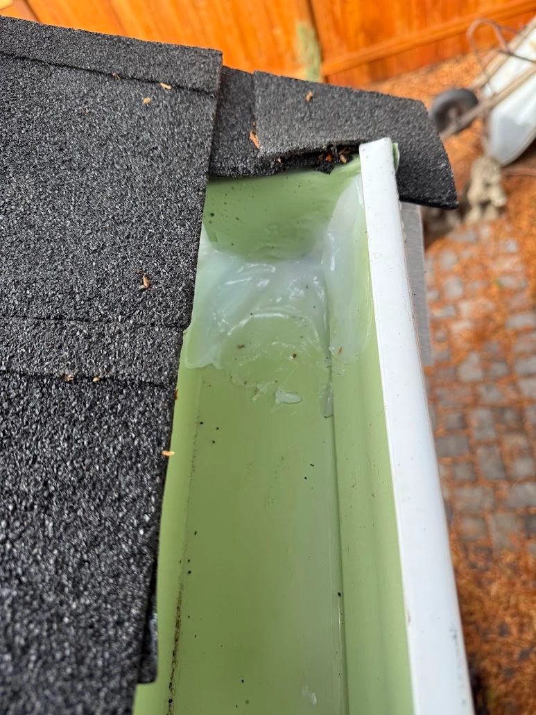 Gutter seam sealed smooth after Osprey Exterior repair