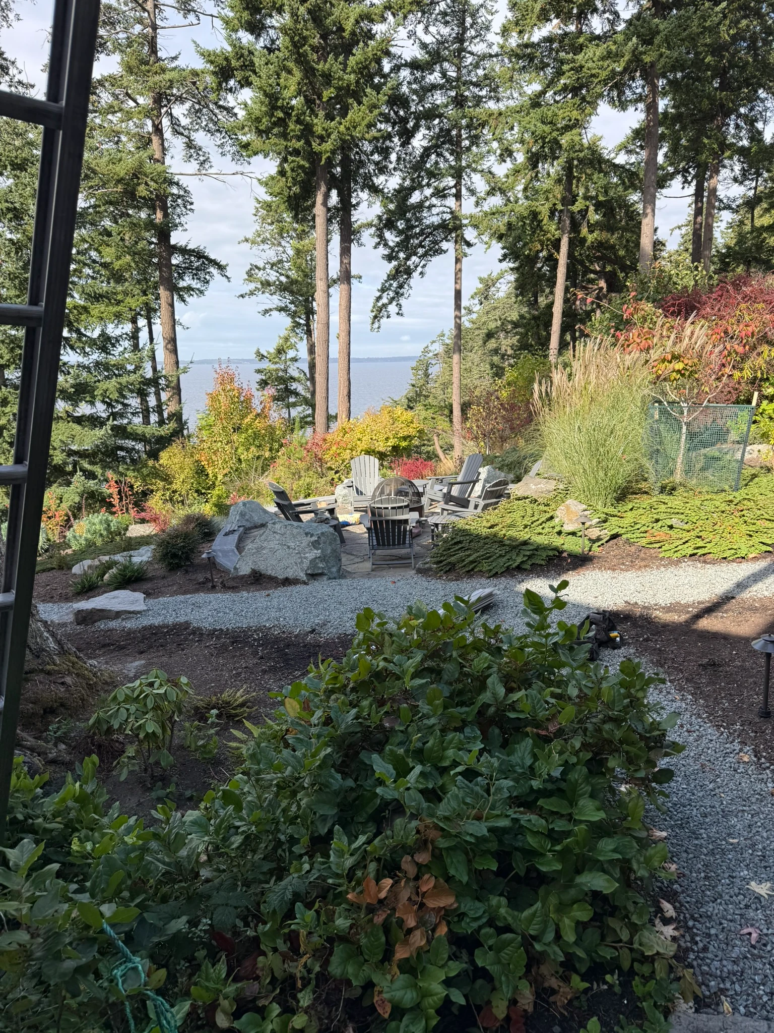 Gravel pathway and fire pit over permeable base