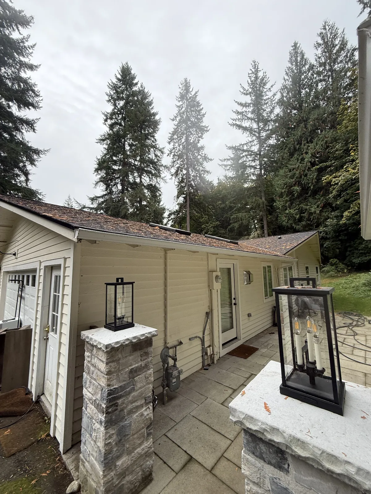 Exterior cleaning crew working on a Redmond home